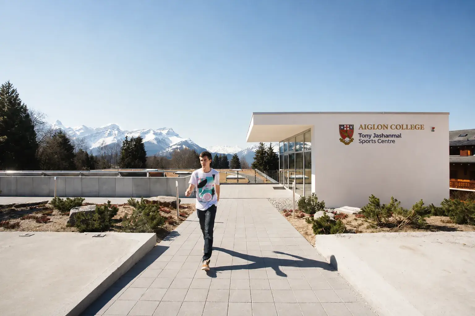 Student walking through the Aiglon Sports Centre