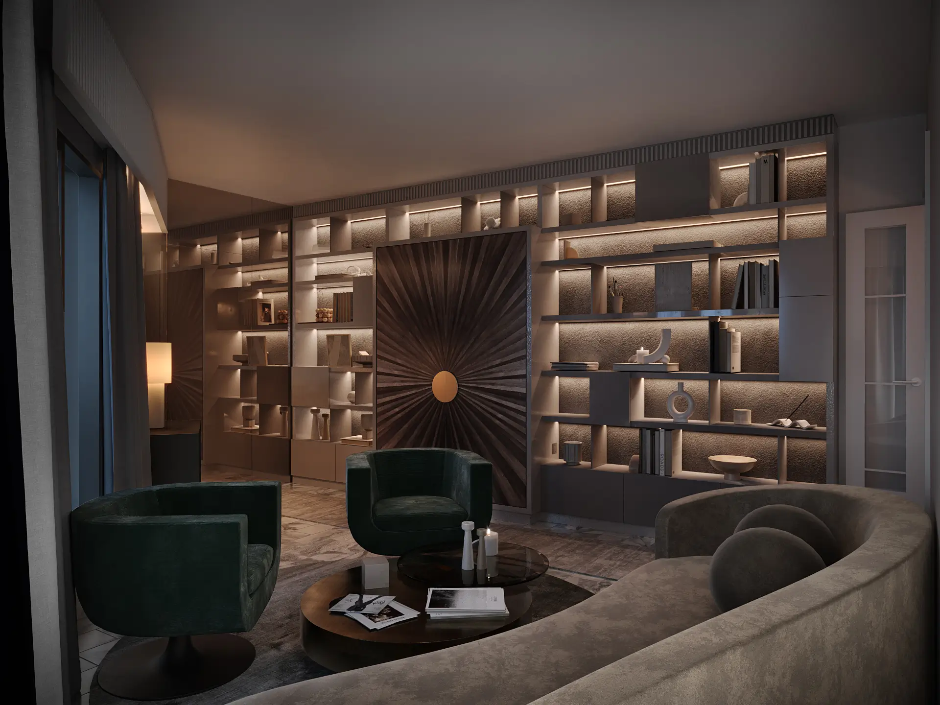 Living configuration: curved sofa and green velvet chairs before an illuminated shelving wall