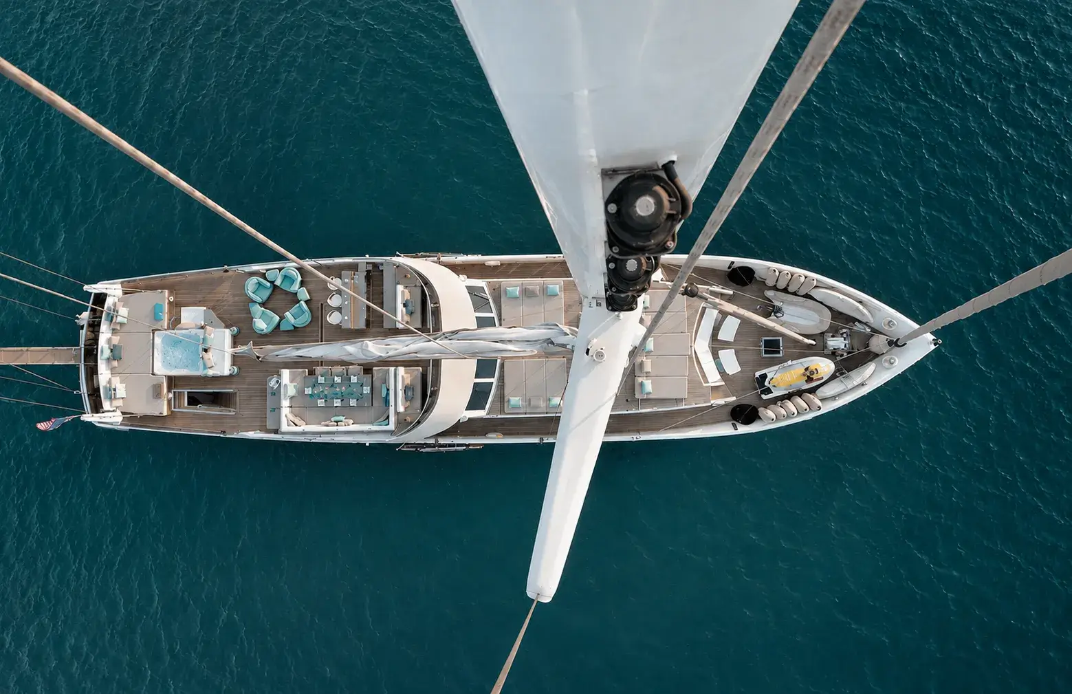 Aerial view of M/Y Mermaid anchored in turquoise water