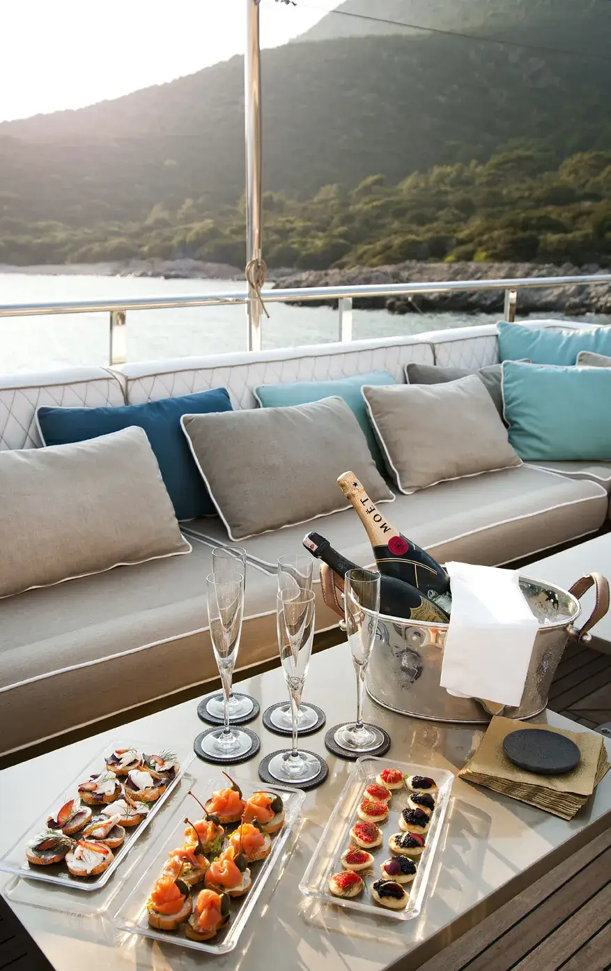 Outdoor lounge deck aboard M/Y Mermaid