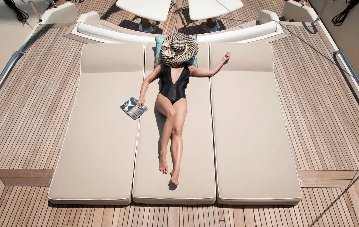 Guests relaxing on deck aboard M/Y Mermaid
