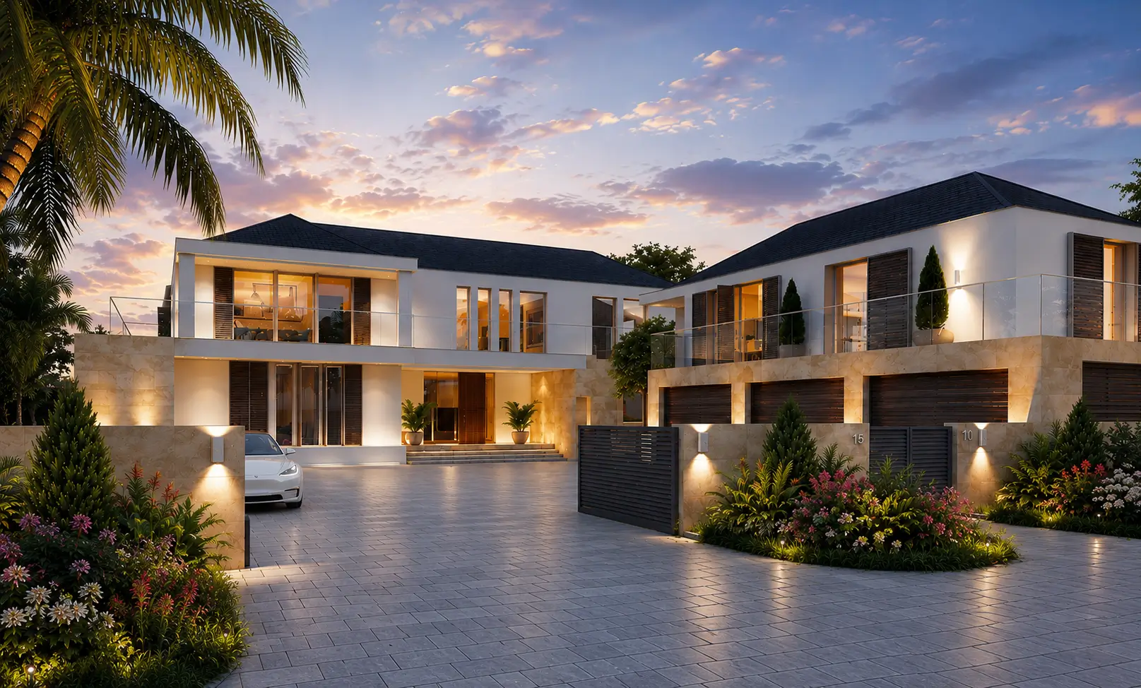 Moonstone front elevation — stone-clad facade with garages and tropical landscaping at sunset