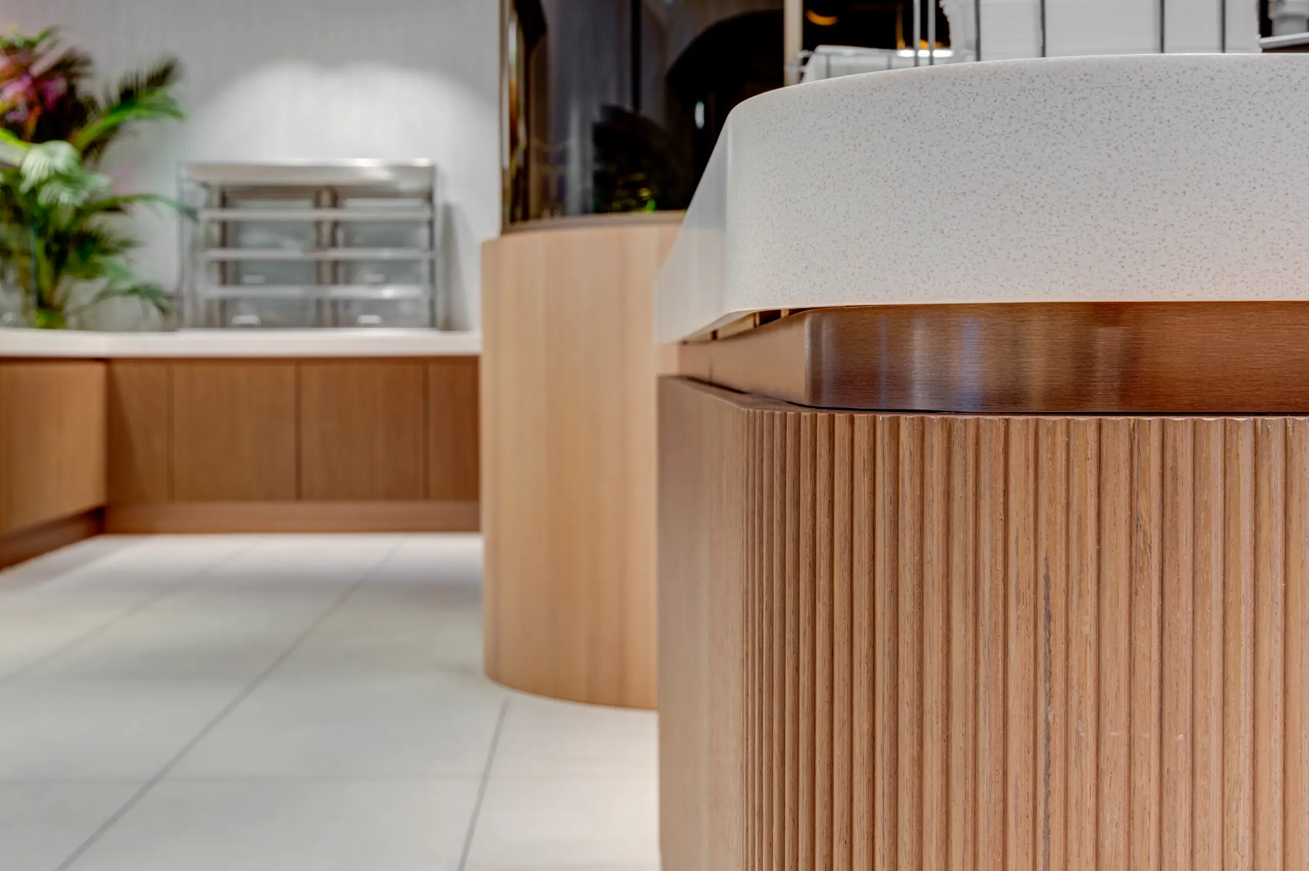 Café seating encouraging spontaneous encounters beyond the meeting rooms