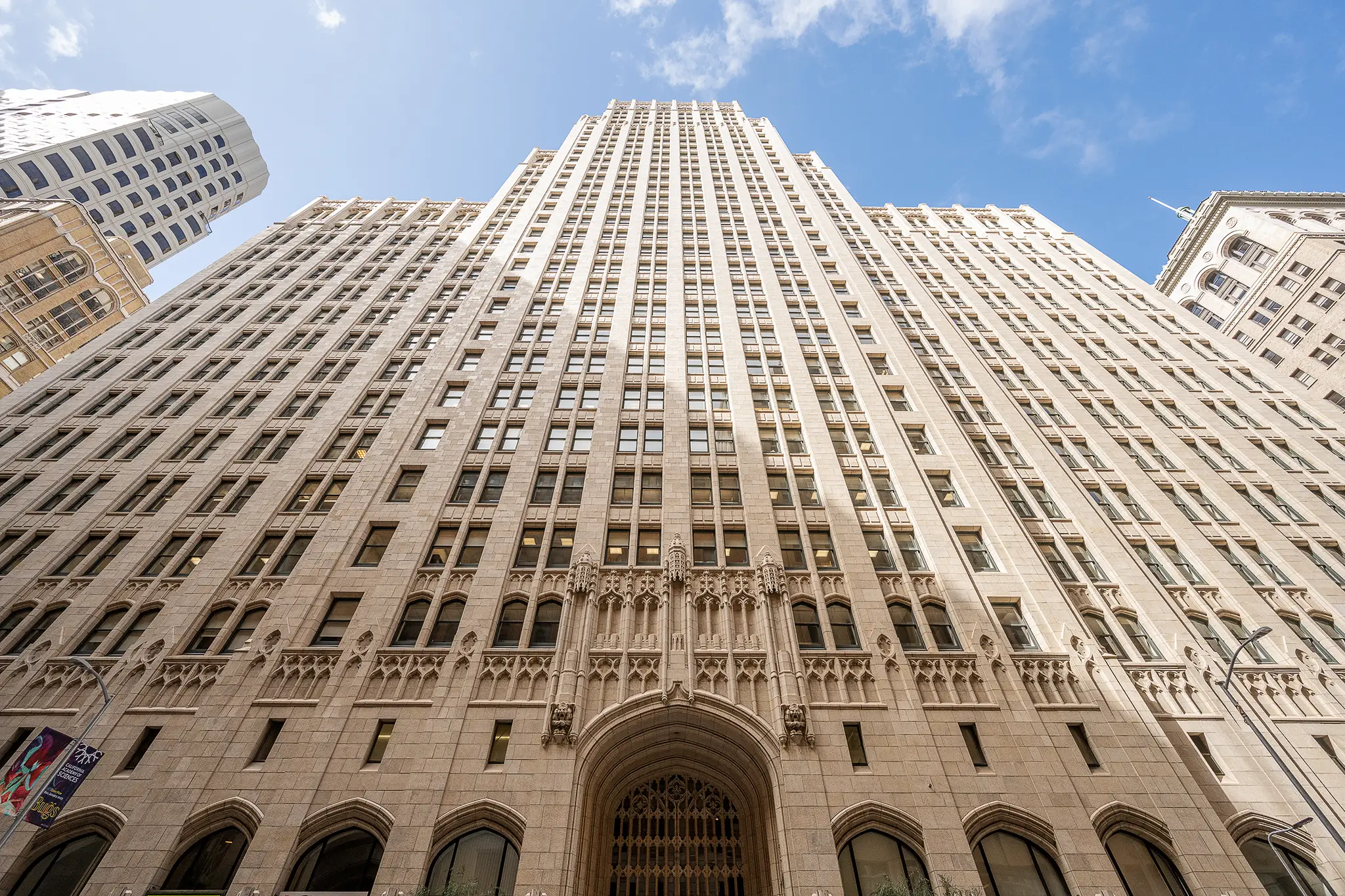 The stripped-down office space in the historic Russ Building — high ceilings, original windows and old radiators forming the canvas for the design