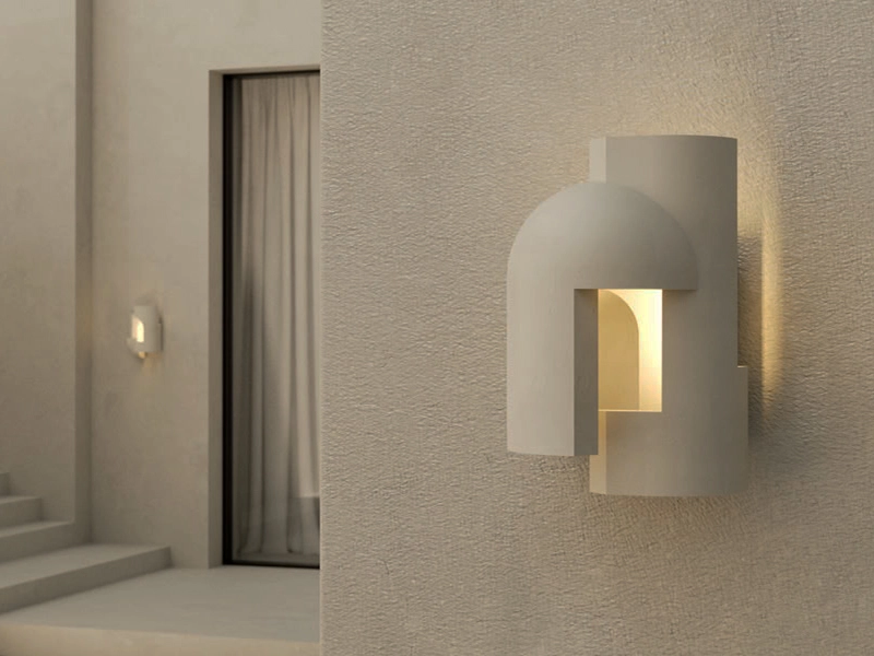 Sculptural wall lamp with arch-shaped cutout
